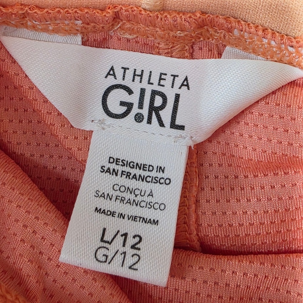 Athleta Girl Orange Pleated Tennis Skirt Built-in Shorts Kids Size L 12 - Picture 3 of 8